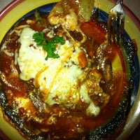 Photo taken at Ricoco&amp;#39;s Latin Grill by Marisol M. on 1/24/2012