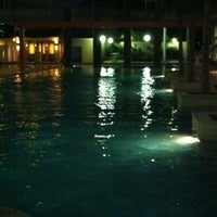 Photo taken at Pool side Gardenia Boulevard by Chicha A. on 1/1/2012