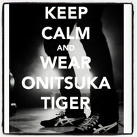 Photo taken at Onitsuka Tiger by Mariam S. on 5/18/2012