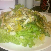 Photo taken at Garota Paulista Burger &amp;amp; Salad by Romulo N. on 2/11/2011
