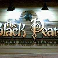 Photo taken at Black Pearl Island Grill by DJ D. on 7/26/2011