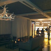 Photo taken at W Hotel Living Room by Paula B. on 12/29/2011