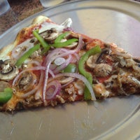 Photo taken at Brownstone Pizzeria by Carla F. on 10/14/2011