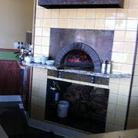Photo taken at Olio Wood Fired Pizzeria by Joseph S. on 12/28/2010