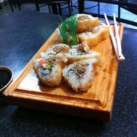Photo taken at Yoko Sushi by Mariana C. on 8/25/2012