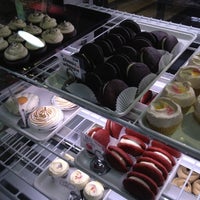Photo taken at Flying Monkey Bakery by Christina Y. on 5/19/2012