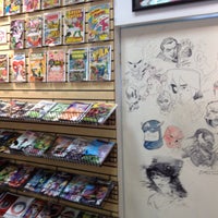 Photo taken at Earth2Comics by Mole M. on 8/16/2012