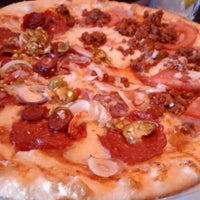 Photo taken at Pizza Mizza by Bradam B. on 9/10/2012