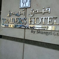 Photo taken at Traders Hotel by Kayode M. on 3/13/2012