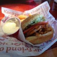 Photo taken at Red Robin Gourmet Burgers and Brews by Darren on 8/17/2012