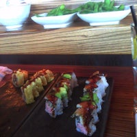 Photo taken at Stingray Sushi by Lizzie F. on 1/12/2012