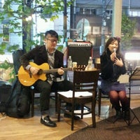 Photo taken at Starbucks Coffee 六本木店 by OTN on 1/28/2012