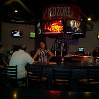 Photo taken at Ragin&amp;#39; Sports Bar &amp;amp; Grill by Tia B. on 2/1/2012
