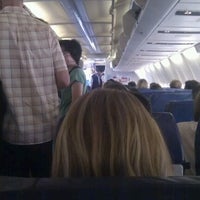 Photo taken at Gate C5 by Giovanni B. on 7/9/2012