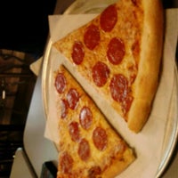 Photo taken at New York Pizza Department by Katy W. on 4/26/2012