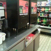 Photo taken at 7- Eleven by Mariana V. on 12/15/2011