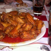 Photo taken at Pullanos Pizza &amp;amp; Wings by Tom K. on 12/24/2011