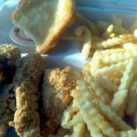 Photo taken at Raising Cane&#39;s Chicken Fingers by Valerie B. on 12/17/2011
