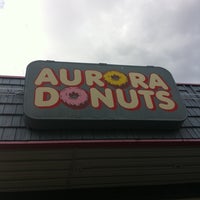 Photo taken at Aurora Donuts by Matthew C. on 10/1/2011