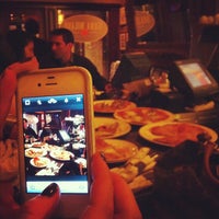 Photo taken at Mama Milano Pizza Bar by Ryan M. on 3/30/2012