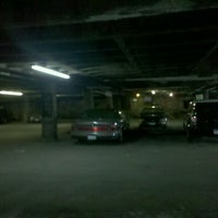 Photo taken at Scariest Parking Garage Ever! by Kerry L. on 5/14/2011