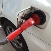 Photo taken at Esso Petrol Kiosk by Vishnu P. on 7/20/2012