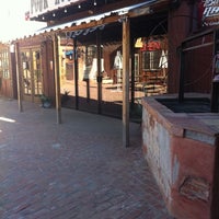 Photo taken at Cave Creek Smokehouse &amp;amp; Pour House Patio by Patty S. on 9/20/2011