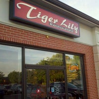 Photo taken at Tiger Lilly Restaurant by Vee F. on 7/16/2011