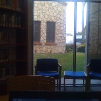 Photo taken at Jungman Library by Timothy M. on 12/14/2011
