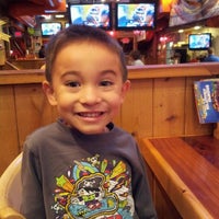 Photo taken at Hooters by Alex G. on 11/18/2011