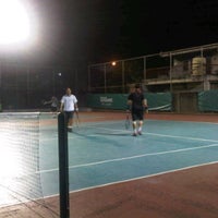 Photo taken at Tennis Court ภาณุรังสี by Tanya N. on 3/26/2012