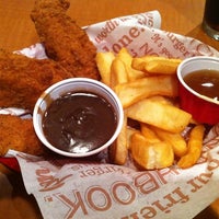 Photo taken at Red Robin Gourmet Burgers and Brews by Paul P. on 9/25/2011