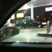 Photo taken at Exxon by Kate W. on 3/2/2012