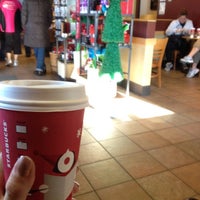 Photo taken at Starbucks by Brittany W. on 12/24/2011