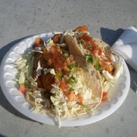 Photo taken at Ricky&amp;#39;s Fish Tacos by Laura C. on 12/18/2011