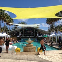 Photo taken at The Pool Parties at The Surfcomber by Daniel R. on 3/18/2012