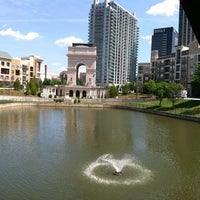 Photo taken at Atlantic Station Pond by Katie W. on 4/4/2012