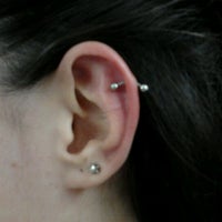 Photo taken at Simple Tattoo Piercing by Leandro R. on 4/21/2012