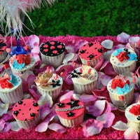 Photo taken at Ennies Cupcakes Factory by Ennie T. on 3/5/2012