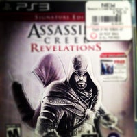 Photo taken at GameStop by Eric F. on 1/26/2012