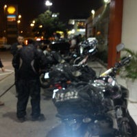 Photo taken at Posto Império (Shell) by Jader O. on 4/28/2012