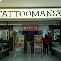 Photo taken at Tattoomania by Juan Carlos G. on 6/28/2011