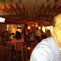 Photo taken at La Tirada Grill by Pilar on 9/1/2012