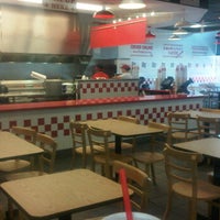 Photo taken at Five Guys by Jarrod R. on 3/2/2012