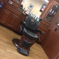 Photo taken at Roosters Men&amp;#39;s Grooming Center by Kirby T. on 7/12/2012