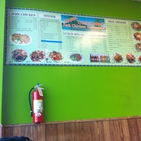 Photo taken at Tropical Island Original Jerk Chicken by Monique on 5/23/2012