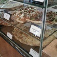 Photo taken at The Brick Oven Pizza by Chris C. on 4/18/2012