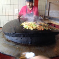 Photo taken at Three Flames Mongolian BBQ by Taneshia C. on 5/25/2012