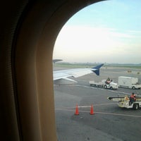 Photo taken at Gate C18 by Tanya D. on 8/14/2012