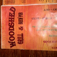 Photo taken at Woodshed Grill and Brew Pub by Mallory H. on 9/10/2011
